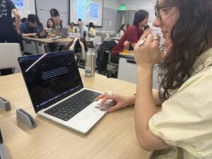 A playtester thinking through a puzzle during an in-class playtest