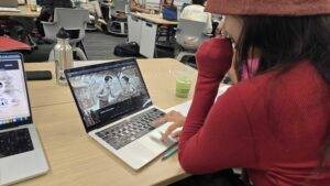 A playtester exploring Remnant on a laptop